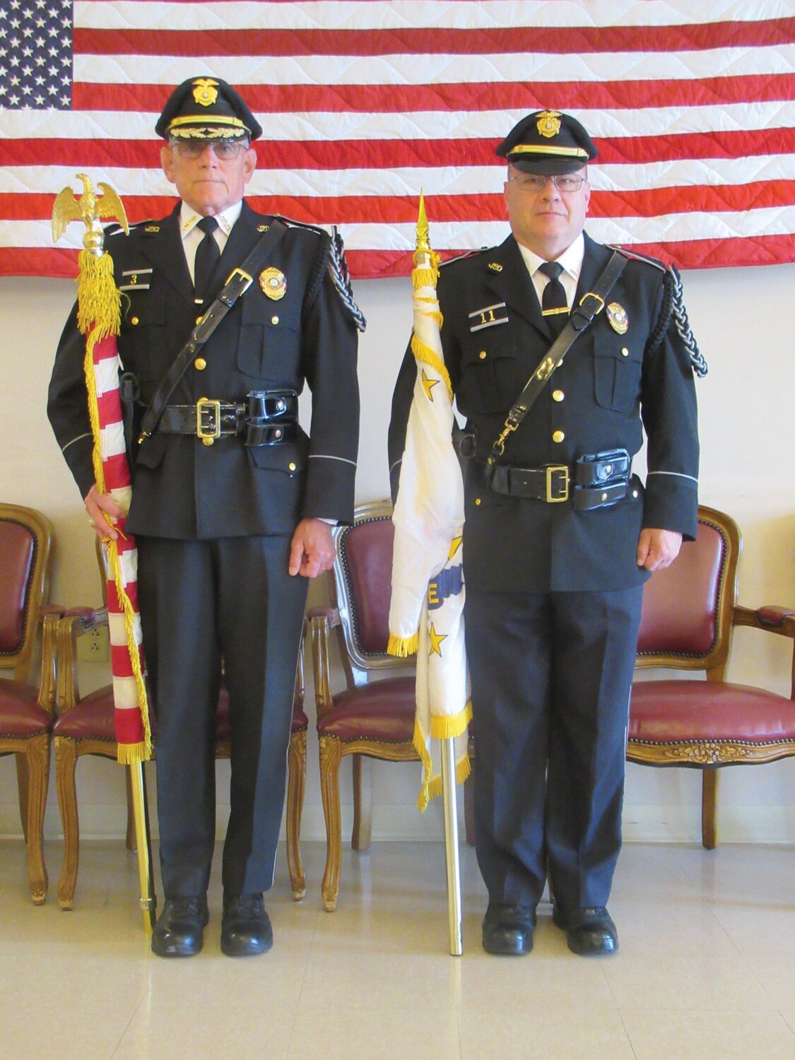PERFECT POSTING: Johnston Police Maj. Thomas Dolan and Lt. Steve Guilmette had the honor of posting the colors for the JSC’s Flag Day 2023.